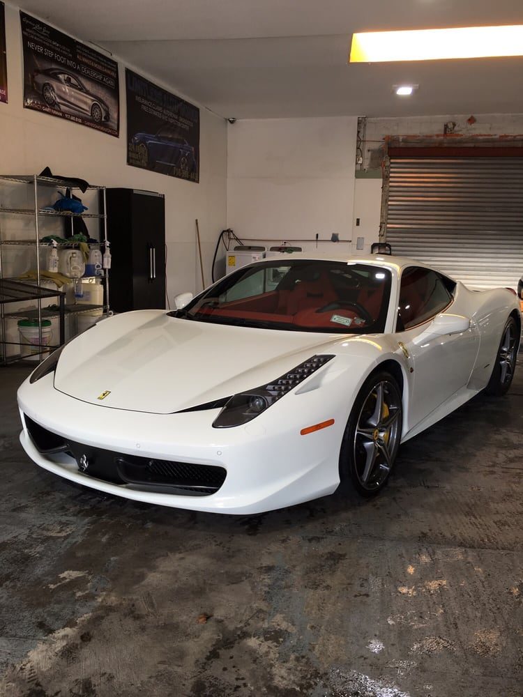 White Ferrari 458 detailed inside the shop
